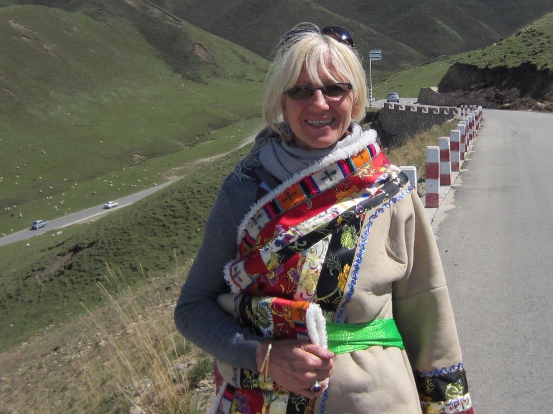 Beata on a roadside in Tibet